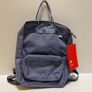 Nike Tanjun light blue small backpack.
